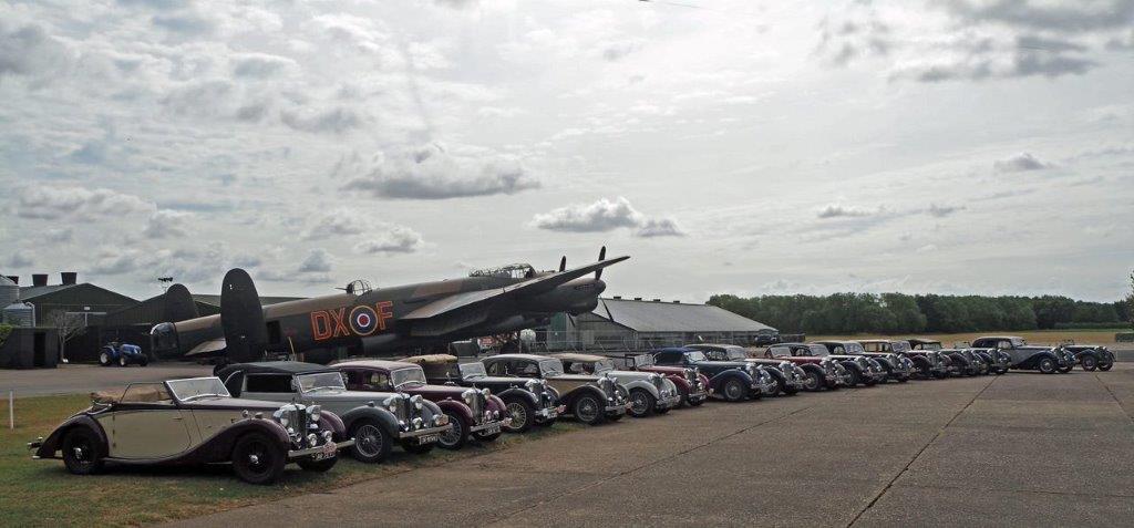 SVW cars in front of a Lancaster bomber